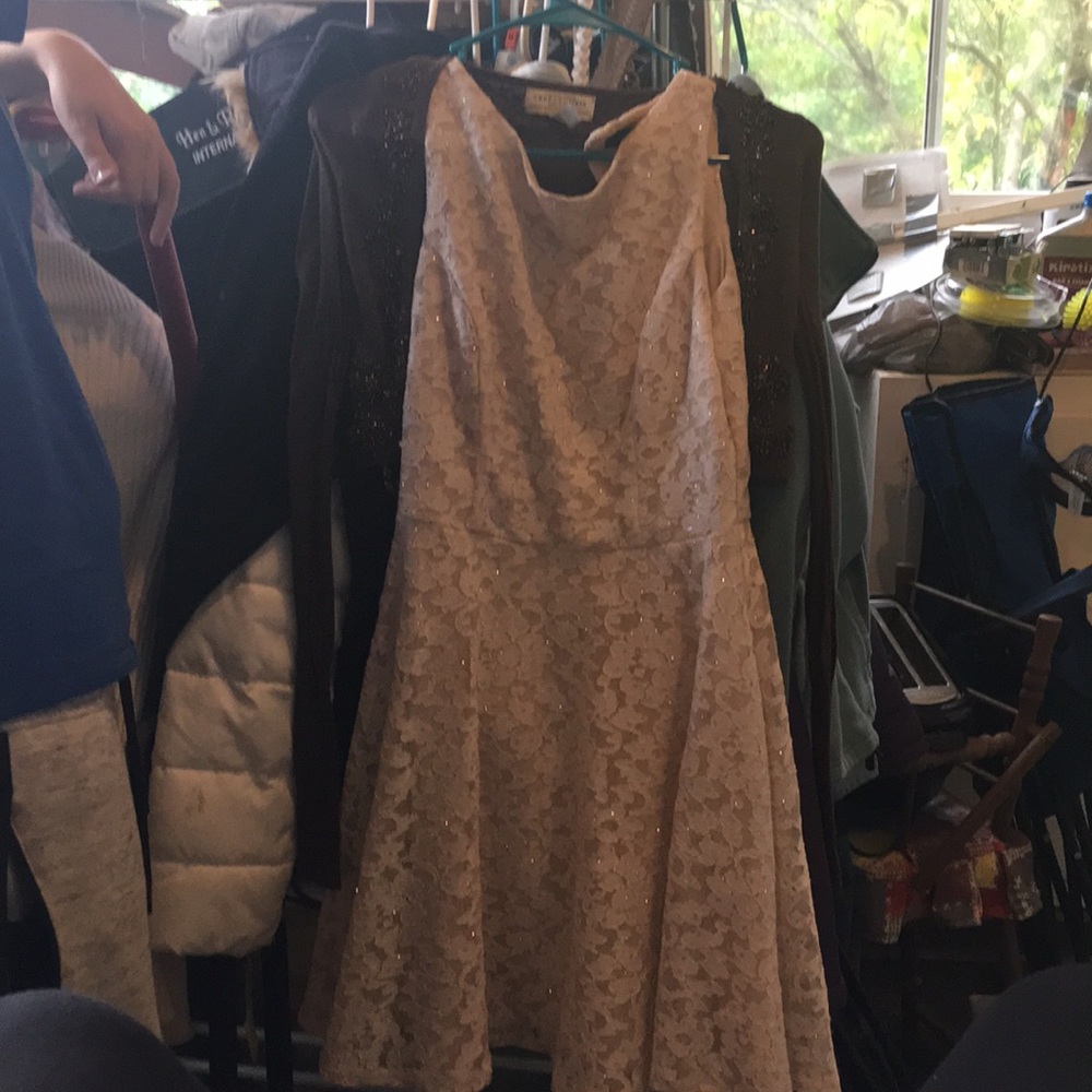 Tan jacket and tan dress